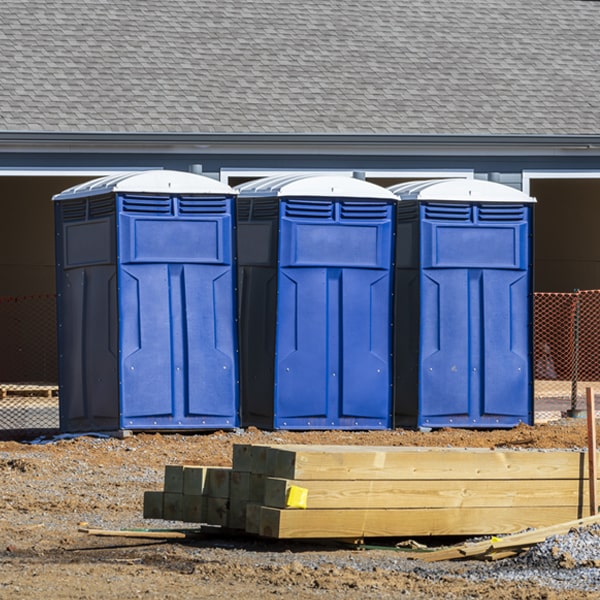 what is the cost difference between standard and deluxe portable toilet rentals in Burlington